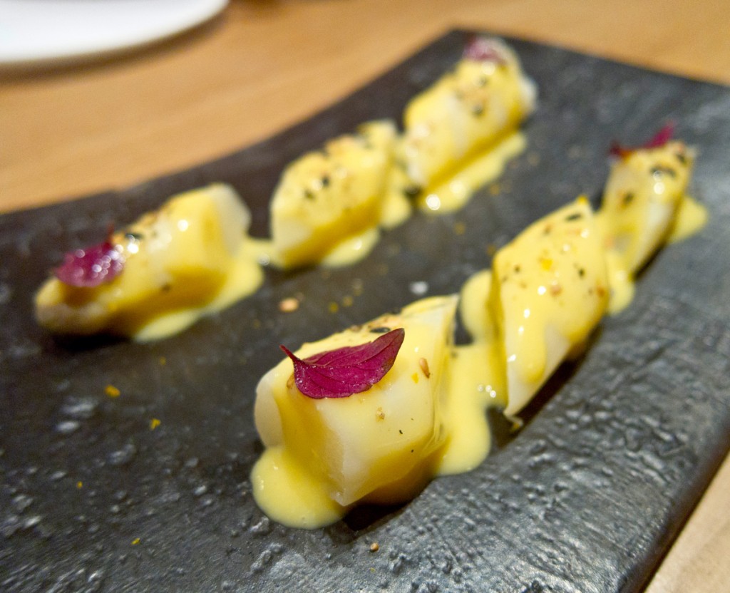 White Asparagus with Kimizu. Basically a yolk and vinegar emulsion there.