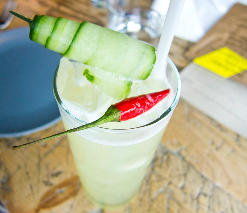 Ubud Hangout - Gin, Jalapeno, black pepper syrup, fresh cucumber, cilantro, and orange bitters.