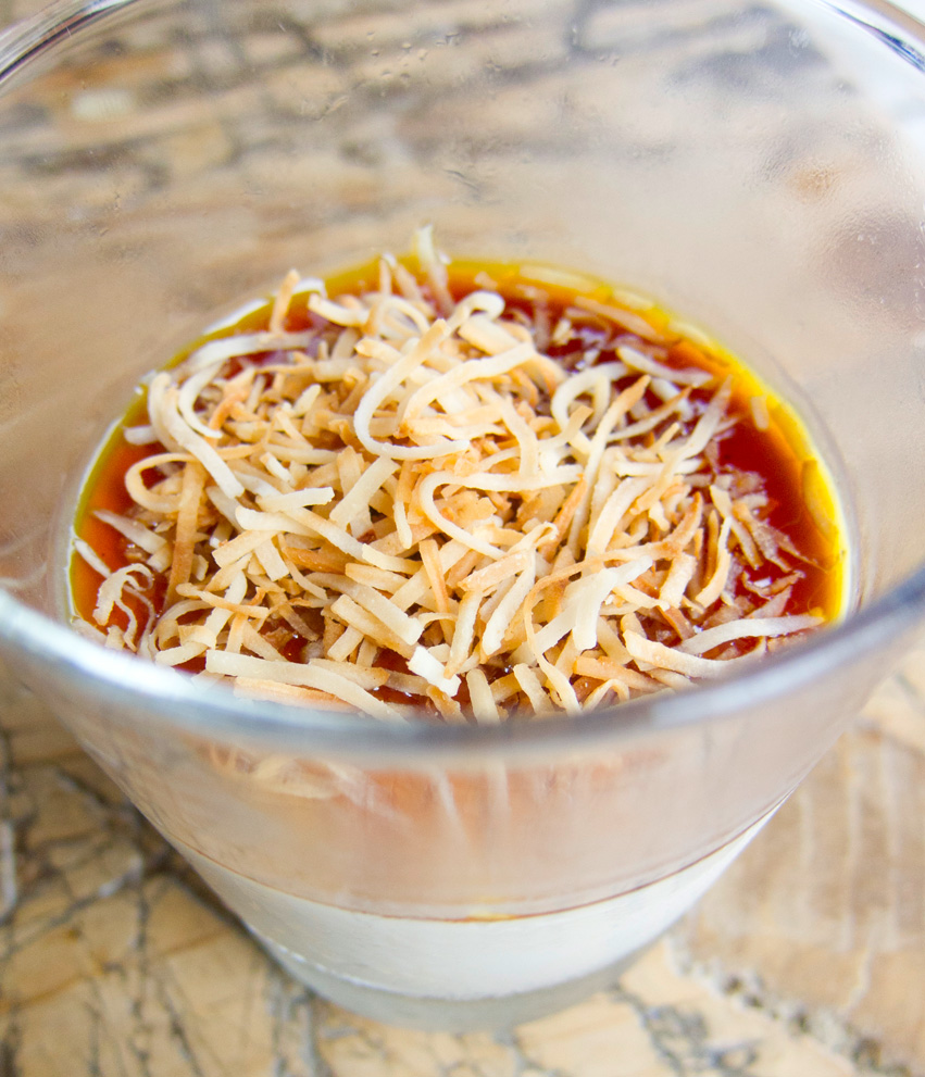 coconut panna cotta with gula melaka, orange, and toasted coconut.