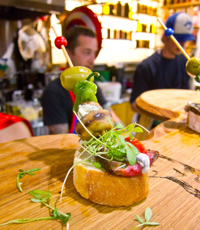 A pintxo of 60-day aged Ribeye with American blue cheese by Chef Grant Van Gameren.